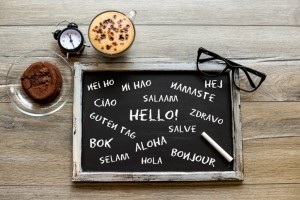 Hello in different languages word cloud on blackboard